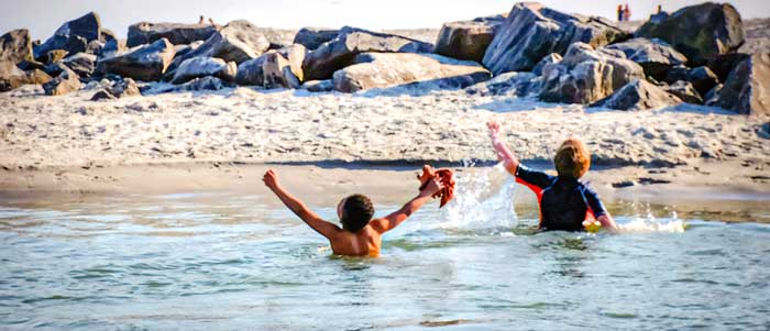 Cal and Enz crossing the Coligny Creek on Hilton Head